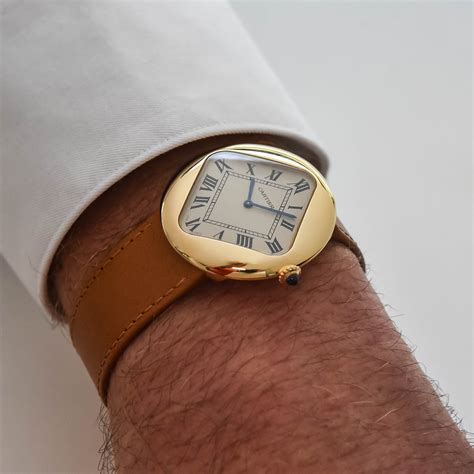 cartier pebble gold edition.